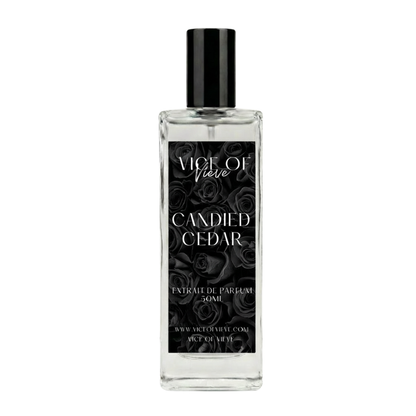 Candied Cedar perfume bottle. A clean gourmand fragrance with sugar crystals, Texas cedarwood, and fluffy musk. Part of the luxury Cashmere Collection.