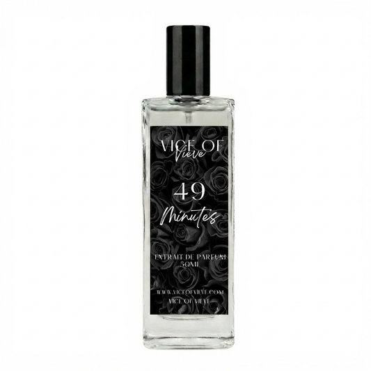 Luxury perfume bottle for '49 Minutes' by Vice of Vieve with a black floral label. A celestial vanilla and sea salt fragrance from the Cashmere Collection.