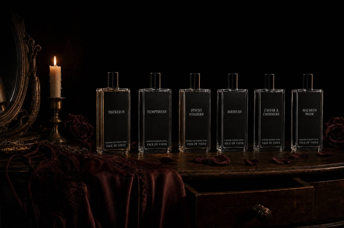 Vice of Vieve extrait de parfum bottles lined up by candlelight