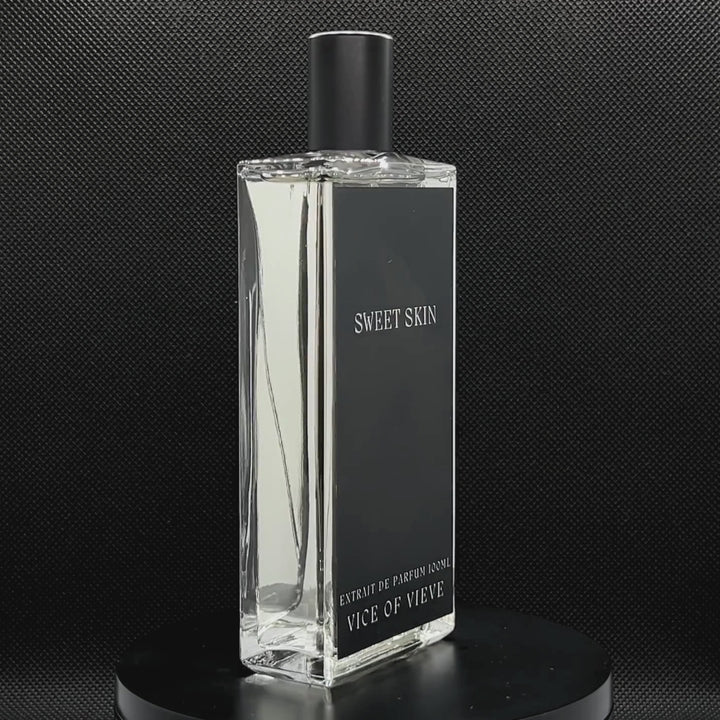 Video rotation of Vice of Vieve Sweet Skin perfume bottle displaying custom artwork design